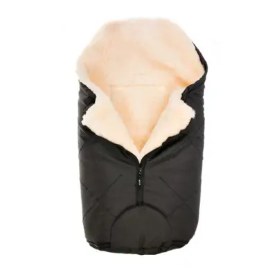 Bozz åkpåse small lammskinn, svart melange/vit korthårig