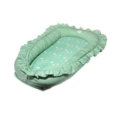 Mini Dreams babynest mönstrad botten med volang, grön