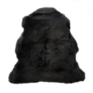 Segr lammskinn, svart långhårig