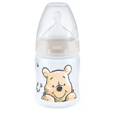 NUK nappflaska First Choice+ 150 ml Nalle Puh, beige
