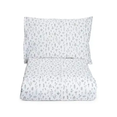 Mini Dreams påslakanset spjälsäng, blomsteräng vit