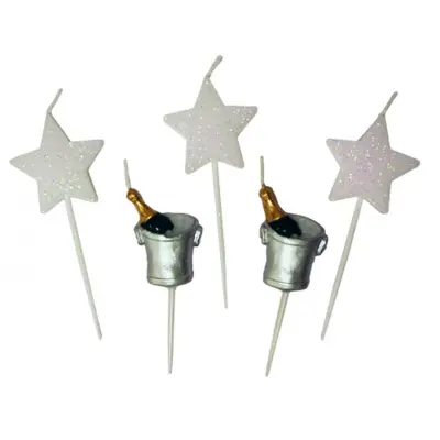 Tårtljus vita stjärnor och ishink med champagne